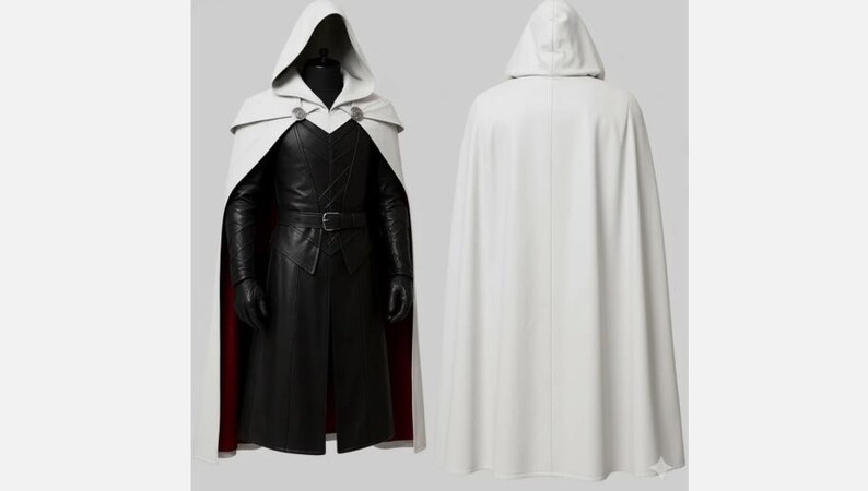 May include: A white hooded cape with silver clasps, paired with a black leather-like coat. The coat has a belt and long sleeves. The cape is shown from the front and back, revealing a red lining on the coat.