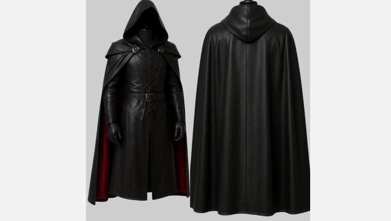 May include: A black hooded cloak and matching coat ensemble. The coat features a belt, decorative stitching, and a red lining visible at the hem. The cloak is shown from the front and back, highlighting the design and details.