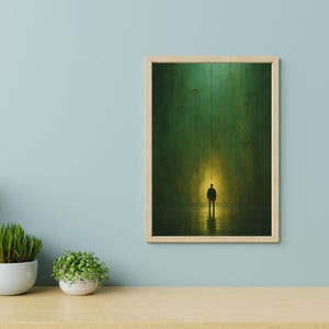 May include: A framed illustration of a person standing in a dark green room with a single lightbulb hanging from the ceiling. The lightbulb casts a yellow glow on the person and the floor.