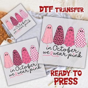 May include: DTF transfer sheets featuring pink ghost designs with various patterns, including polka dots, leopard print, and hearts. The text "in October we wear pink" is included. The phrase "READY TO PRESS" is also visible.