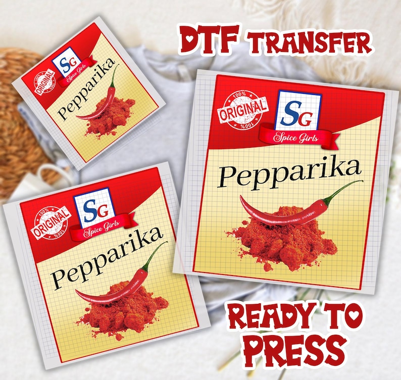 Pode incluir: Tr&ecirc;s embalagens vermelhas e brancas com a inscri&ccedil;&atilde;o "Pepparika", uma ilustra&ccedil;&atilde;o de pimenta vermelha e p&oacute; vermelho. As embalagens exibem o texto "DTF TRANSFER" e "READY TO PRESS".
