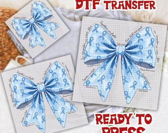 May include: Three DTF transfer sheets featuring light blue ribbon bows with text. The text includes phrases like "Together we fight" and "In November we wear blue." The words "READY TO PRESS" are also visible.