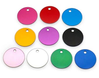 May include: Ten round metal tags in various colors, including pink, red, blue, yellow, purple, black, light pink, white, green, and dark blue. Each tag has a small hole at the top for attaching a key ring or chain.