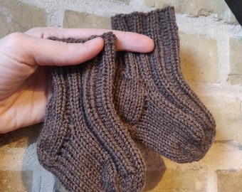 Warm and soft hand knitted brown baby newborn socks. Various sizes and colours available