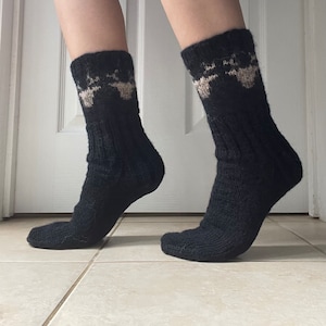 Hand knit black wool socks with reindeer buck pattern in brown grey fairisle winter warm nordic scandi norwegian latvian