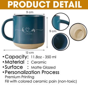 May include: A teal ceramic mug with a beige base, featuring the initials "h & m" and the date "1.09.2026". The mug is 12 cm wide and 9 cm tall, with a capacity of 350 ml. It has a matte glazed surface.