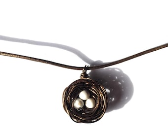 Hummingbird bird nest pendant necklace with white eggs. Pick your choice of eggs and letter initials charms!