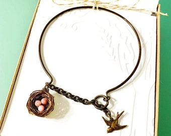 Personalized bird nest bracelet with Peruvian pink opals, inspired by the Carolina wren. Pick your choice of eggs and initials charms!