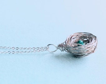 Serling silver blue eggs bird nest pendant necklace with semiprecious Kingman turquoise. Argentium chain. Personalize by picking your eggs!