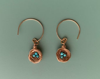 Tiny bird nest earrings with Kingman turquoise and 10K Gold plated posts. Pick the number of eggs you wish in your nest.