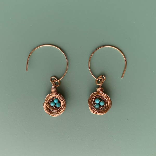 Tiny bird nest earrings with Kingman turquoise and 10K Gold plated posts. Pick the number of eggs you wish in your nest.