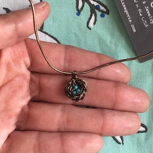 Mini bird nest pendant necklace with blue eggs made of Kingman turquoise from Arizona. Pick your choice of eggs and initials!