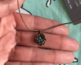 Mini bird nest pendant necklace with blue eggs made of Kingman turquoise from Arizona. Pick your choice of eggs and initials!