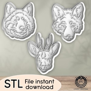 Könnte beinhalten: Drei weiße Ausstecher aus Kunststoff in Form von Tierköpfen: ein Wolf, ein Fuchs und ein Hirsch. Der Text "STL File instant download" steht unten. Ein Logo mit dem Text "LOVELY CREATIONS" befindet sich unten rechts.