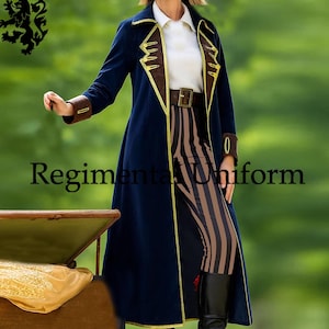 May include: A navy blue long coat with gold trim and brown accents, paired with striped pants and a brown belt. The coat has a high collar and decorative details. The text "Regimental Uniform" is visible.