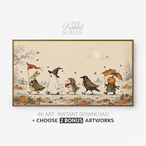 May include: A framed horizontal wall art print featuring a whimsical autumn scene with a rabbit, a ghost, a hedgehog, a crow, and a pumpkin-headed figure walking through a landscape with pumpkins and falling leaves. Text reads THE FRAMED SCREEN.