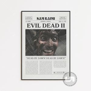 May include: A framed poster for the film "Evil Dead II" with a black border. The poster has a newspaper-style layout, featuring a distressed image of a man's face. The movie title and credits are displayed, along with the text "Dead by Dawn! Dead by Dawn!"