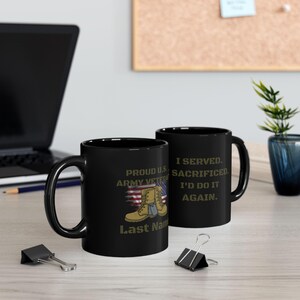 May include: Two black ceramic mugs. One mug features the text "PROUD U.S. ARMY VETERAN" with an American flag and military boots graphic. The other mug reads "I SERVED. SACRIFICED. I'D DO IT AGAIN."