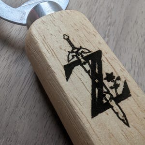 Handcrafted Engraved Zelda Bottle Opener - Unique Zelda Logo & Triforce Gift for Gamers