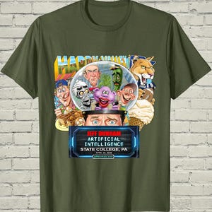 May include: Olive green t-shirt featuring a colorful graphic of various cartoon characters inside a snow globe. The graphic includes the text "HAPPY VALLEY" and "JEFF DUNHAM ARTIFICIAL INTELLIGENCE STATE COLLEGE, PA APRIL 23, 2026".