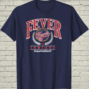 May include: A set of three ceramic mugs with a speckled, matte finish. The mugs are in shades of cream, light gray, and dark gray. Each mug has a simple, minimalist design and a rounded handle.