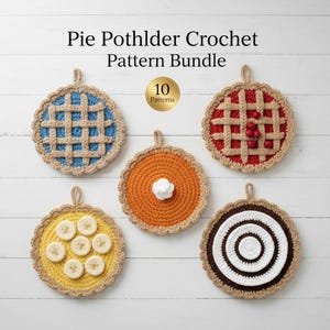 May include: Five crocheted pie-shaped potholders in various designs, including a lattice crust and a pumpkin pie with cream. The potholders are in different colours and have a loop for hanging. Each potholder is approximately 20 cm in diameter.