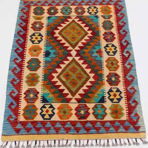 Hand woven wool floor rug