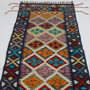 Hand woven floor rug colorful