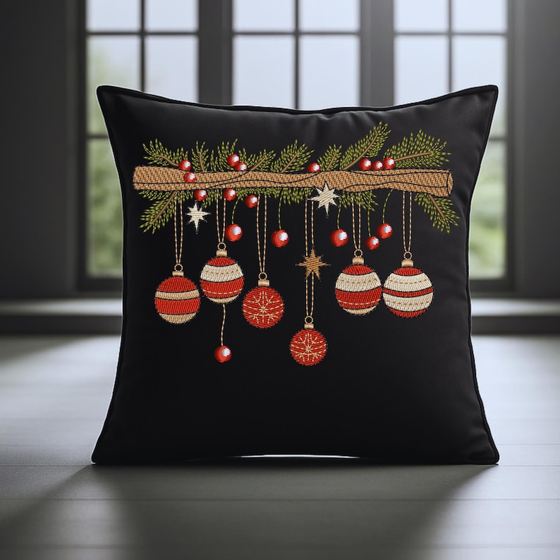 Christmas ornament embroidery design stitched on black decorative pillow – red baubles and pine branch festive embroidery