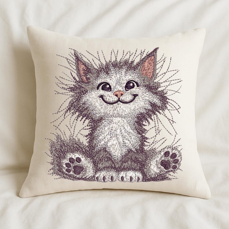 Cream pillow with fluffy cat embroidery design, ideal for nursery decor, kids' rooms, and cozy handmade home accents for pet lovers.
