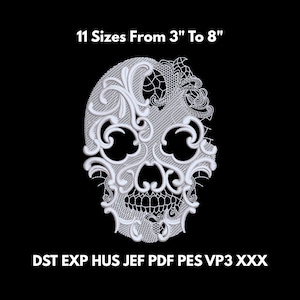 May include: White embroidered skull design with ornate scrollwork and lace details. The design is available in 11 sizes, ranging from 3 to 8 inches. The image includes the text "11 Sizes From 3" To 8"" and file type abbreviations.