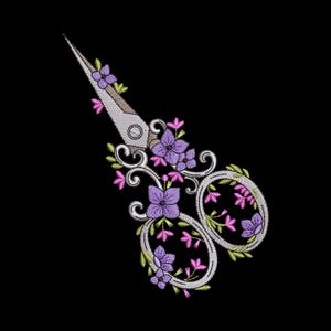 May include: An embroidery design of vintage-style scissors featuring intricate silver metalwork on the handles and blades, adorned with detailed purple flowers, small pink blossoms, and vibrant green leaves wrapped around the entire frame.
