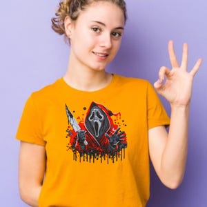 Ghost face horror embroidery design displayed on yellow t-shirt – digital Halloween machine embroidery file for download