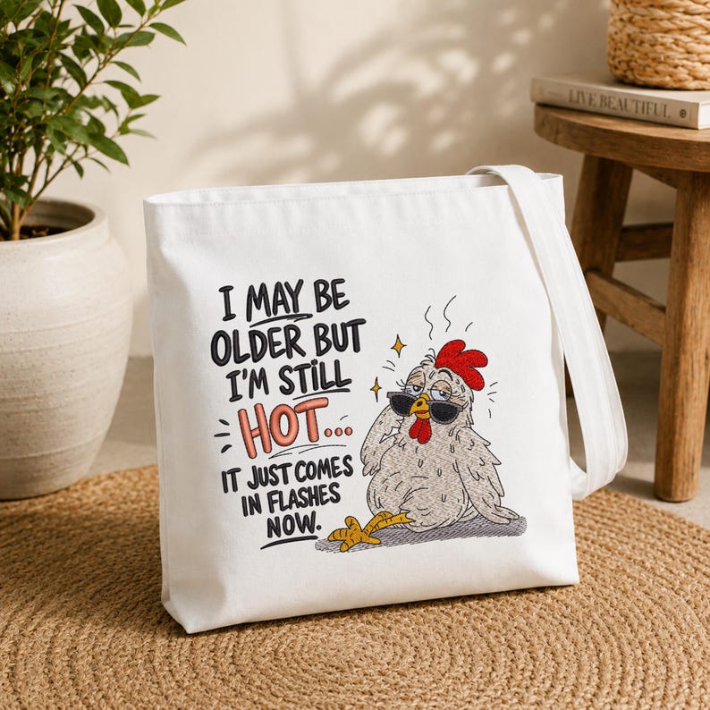 Canvas tote bag featuring a funny chicken embroidery design with hot flashes quote, machine embroidery file for everyday bags, farmhouse accessories and chicken lover gifts.