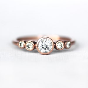 14K Rose Gold Moissanite Engagement Ring, Graduated Five Stone Bezel Set Ring, 5mm Center Stone, Diamond Alternative