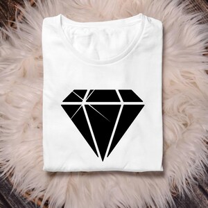 May include: A white t-shirt with a black diamond graphic printed on the front.