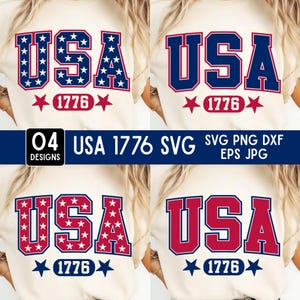 Op de afbeelding: Een crèmekleurig t-shirt met vier variaties van de tekst USA en 1776. De ontwerpen bevatten blauwe letters met witte sterren, effen blauwe letters, rode letters met witte sterren en effen rode letters, gecombineerd met rode of blauwe sterren.