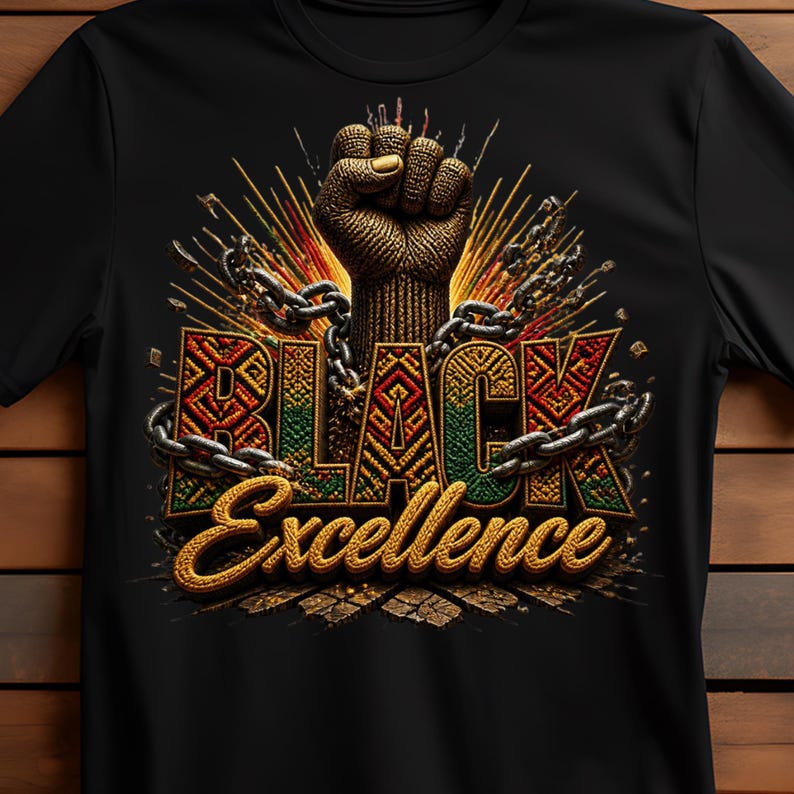 May include: Black t-shirt featuring a raised fist design with the words "BLACK Excellence". The text is in gold, red, green, and black, with a chain wrapped around it. The design has a textured, detailed appearance.
