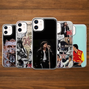 May include: A selection of mobile phone cases showcasing images of Michael Jackson. The cases feature portraits, album artwork, and the word "Thriller". The cases are in various colours and designs.