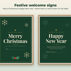 May include: Two rectangular signs with dark green backgrounds and thin gold borders. One sign reads Merry Christmas with snowflake icons and holly. The other reads Happy New Year with snowflake icons. Both feature text fields for names.