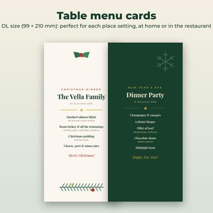 K&ouml;nnte beinhalten: Zwei rechteckige Tischmen&uuml;karten mit den Ma&szlig;en 99 x 210 mm. Die linke Karte ist cremefarben mit roten und gr&uuml;nen Weihnachtsgrafiken und tr&auml;gt den Titel The Vella Family Christmas Dinner. Die rechte Karte ist dunkelgr&uuml;n mit einer Schneeflocke.