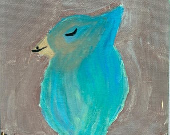 May include: A painting of a blue bird with its eyes closed, perched on a branch. The background is a light brown colour.