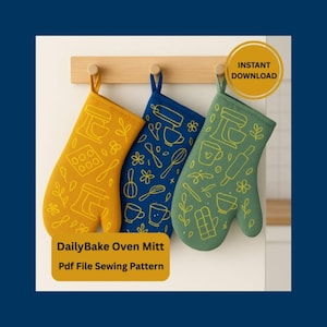May include: Three colorful oven mitts hang on a wooden rack. The mitts are mustard yellow, blue, and green, each with a different kitchen-themed design in a contrasting color. Text on the image reads "DailyBake Oven Mitt" and "Pdf File Sewing Pattern."