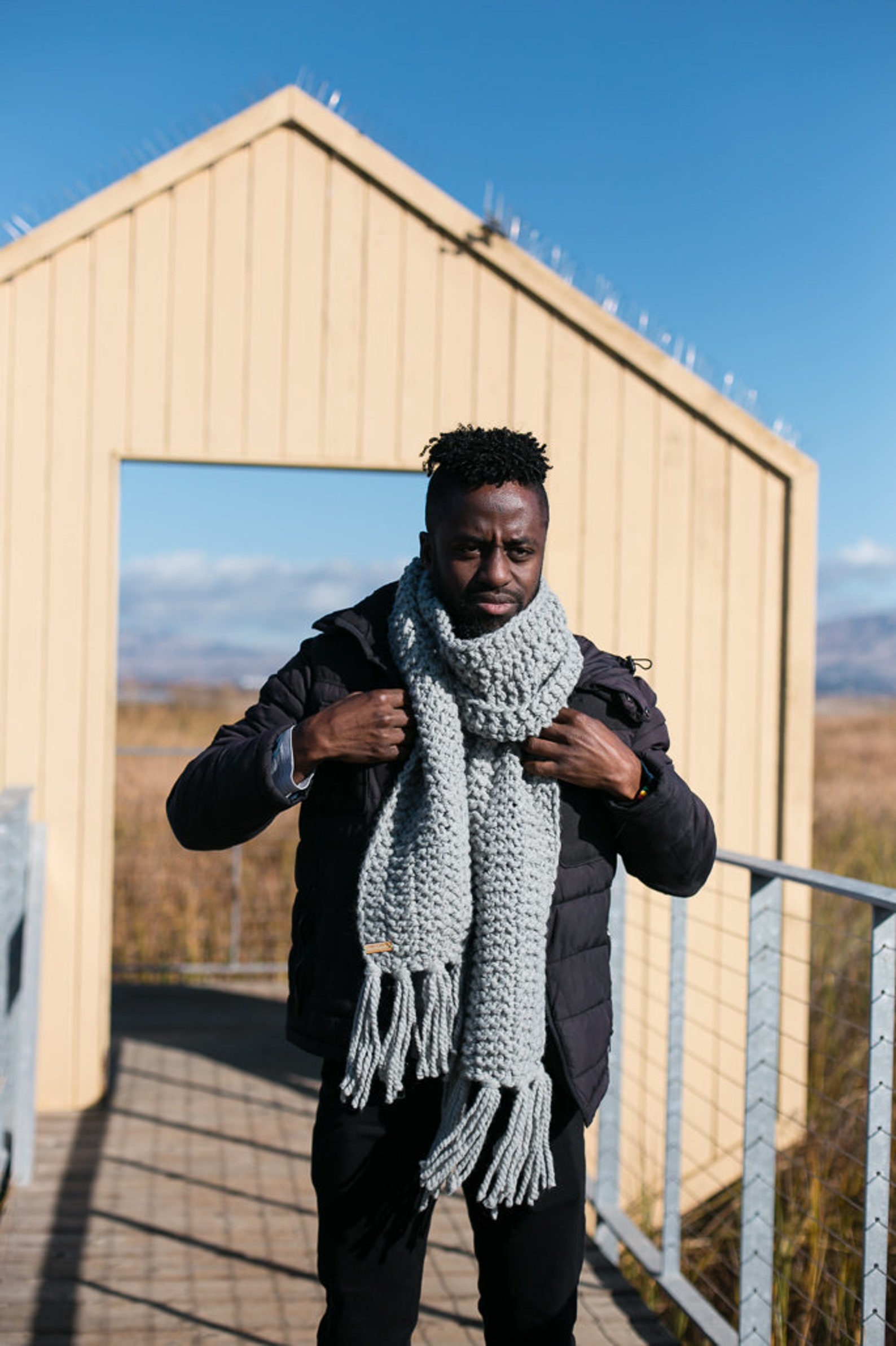 Grey hand-knit scarf