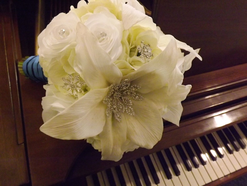 Starburst snowflake crystal brooch bouquet roses and real touch Casablanca lilies creamwhite hydrangea