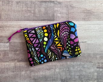 Rainbow Doodle Print Zippered Pouch: Small Cosmetic Bag, Coin Purse (6.25x4.5") with Purple Zipper and Fuchsia Lining.
