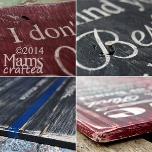 May include: A close-up of a wooden sign with the text "I don't mind getting old, I just don't want to look it." The sign is painted in black and red with white lettering. The sign is distressed and has a rustic look. The text "&copy;2014 Mams crafted" is also visible on the sign.