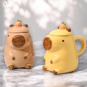 Ceramiczny kubek do kawy z pokrywką Kapibara | Filiżanka do herbaty ze słodkimi zwierzętami z kreskówek | Zabawny projekt pary kapibary | Nowatorski kubek z kapibarą o pojemności 450 ml