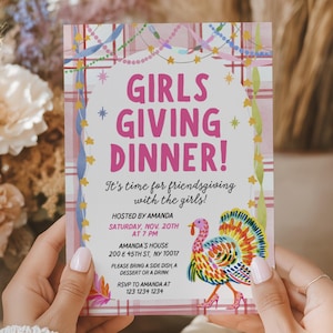May include: A rectangular invitation card featuring a pink plaid border and colorful streamers. The text reads GIRLS GIVING DINNER! It's time for friendsgiving with the girls! HOSTED BY AMANDA SATURDAY, NOV. 20TH AT 7 PM AMANDA'S HOUSE 200 E 45TH ST, NY 10017.