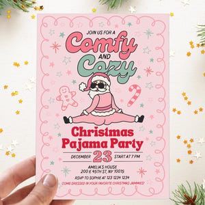 May include: A pink Christmas pajama party invitation with a cartoon Santa Claus wearing sunglasses. The invitation includes the text "Comfy and Cozy," "Christmas Pajama Party," and event details. The design features stars and a gingerbread man.